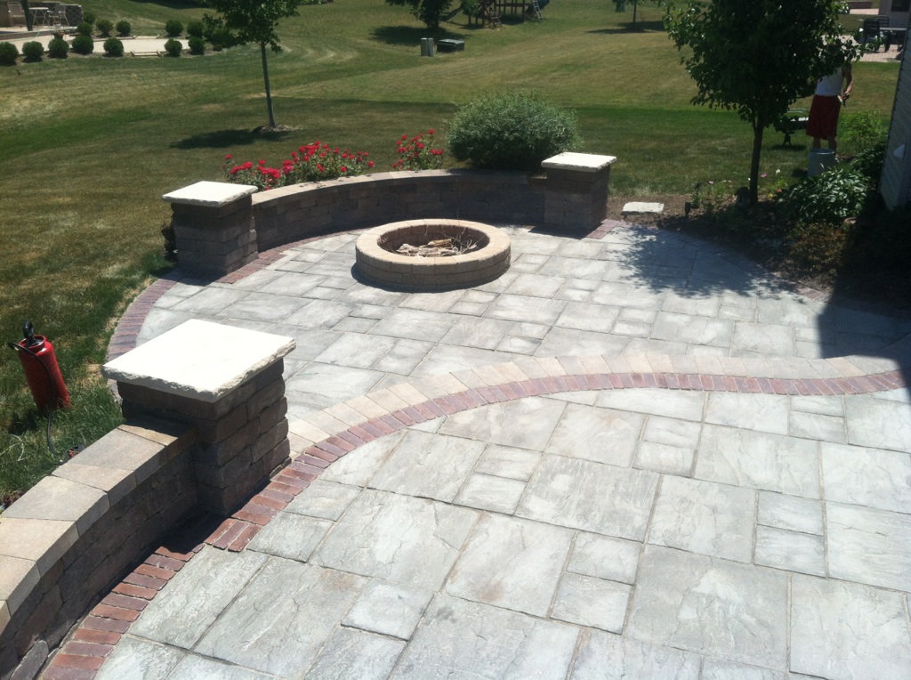 Before Photo of Stone Deck with Fire Pit