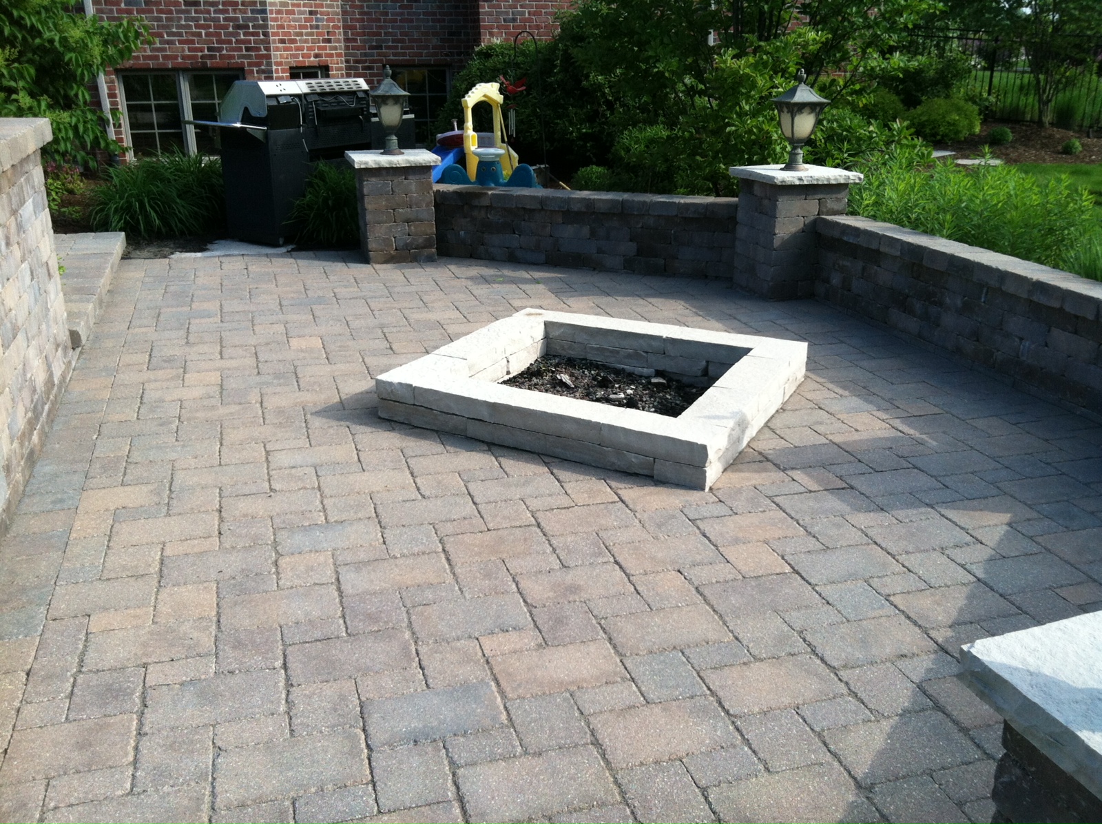Before Photo of Stone Patio with Fire Pit
