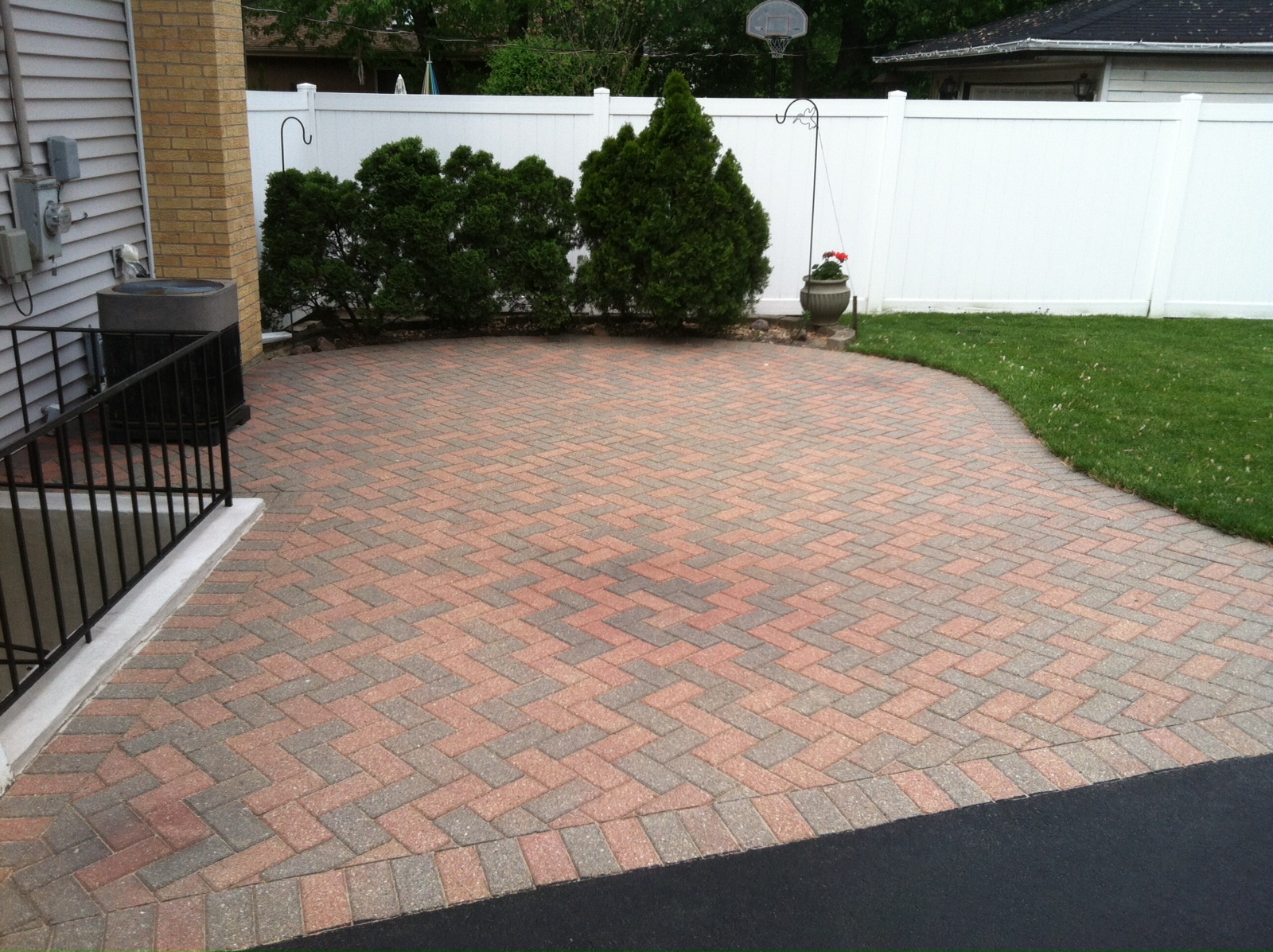 Before Photo of Driveway with Multi-Colored Stones